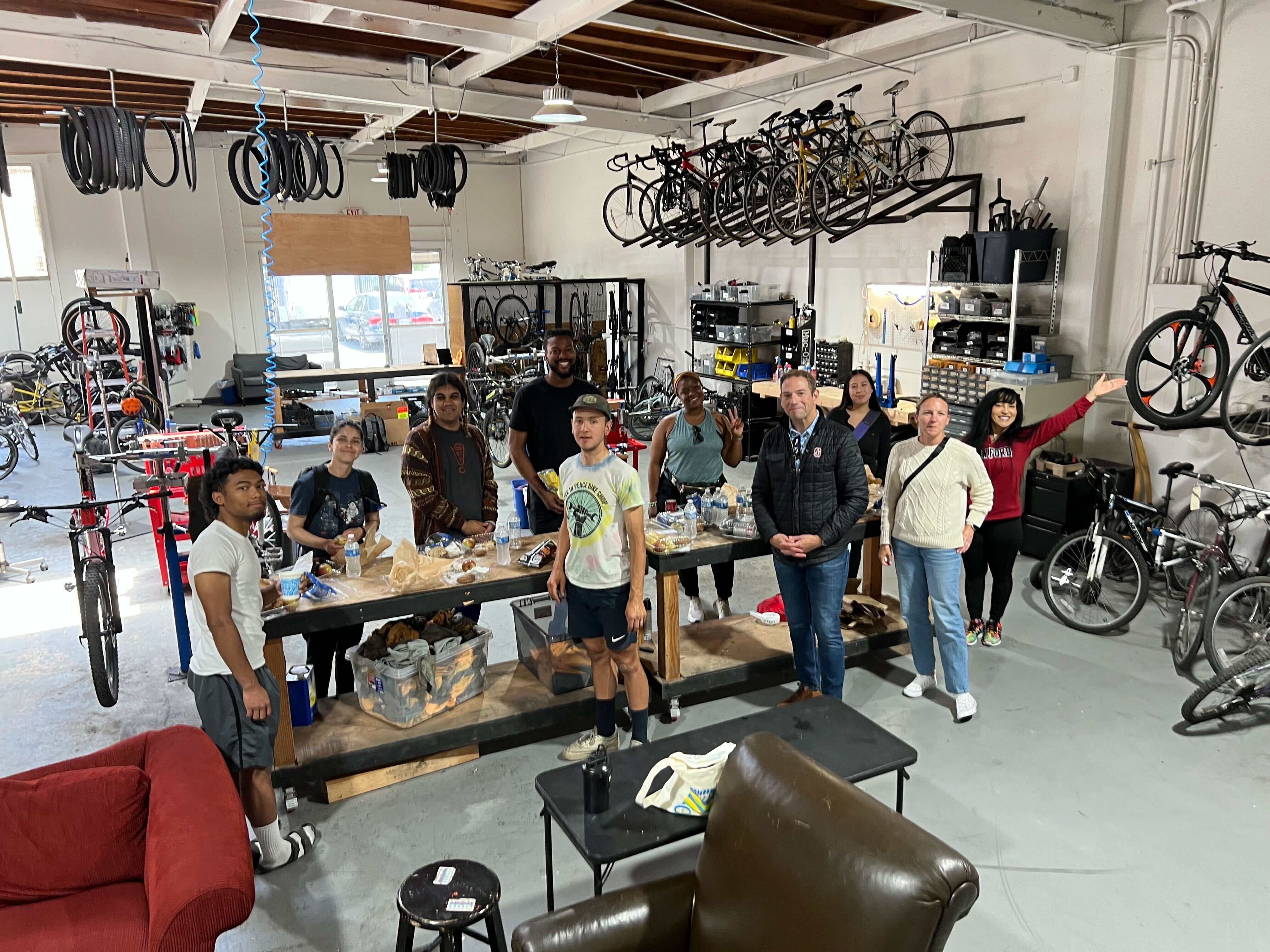 Stanford Transportation Visits Live in Peace Bike Shop Stanford